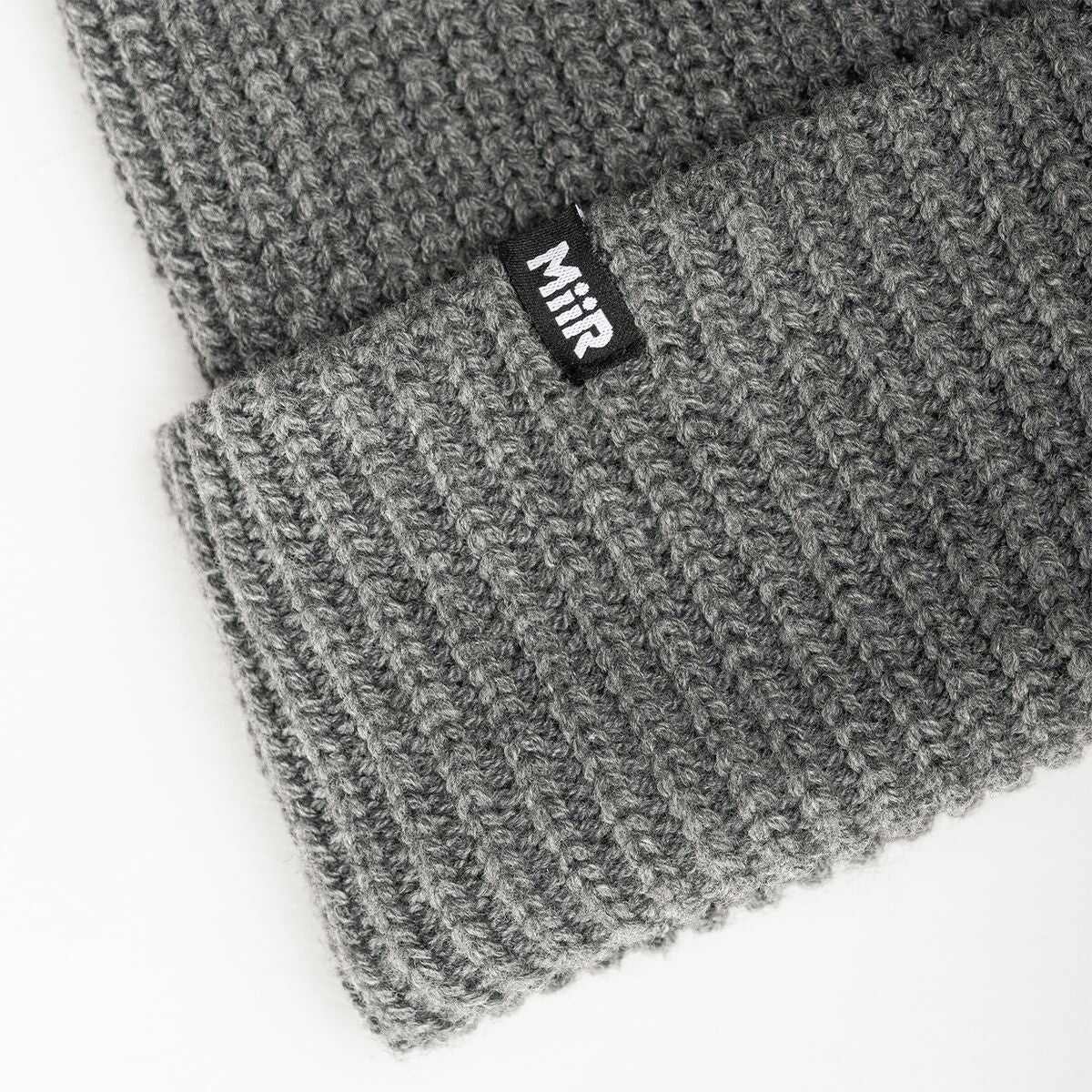 jodie-williams-beanie-p4 WebPDP-RecycledPolyRibBeanie_Studio_TagDetail_GrayHeather__BNE002400OS.jpg